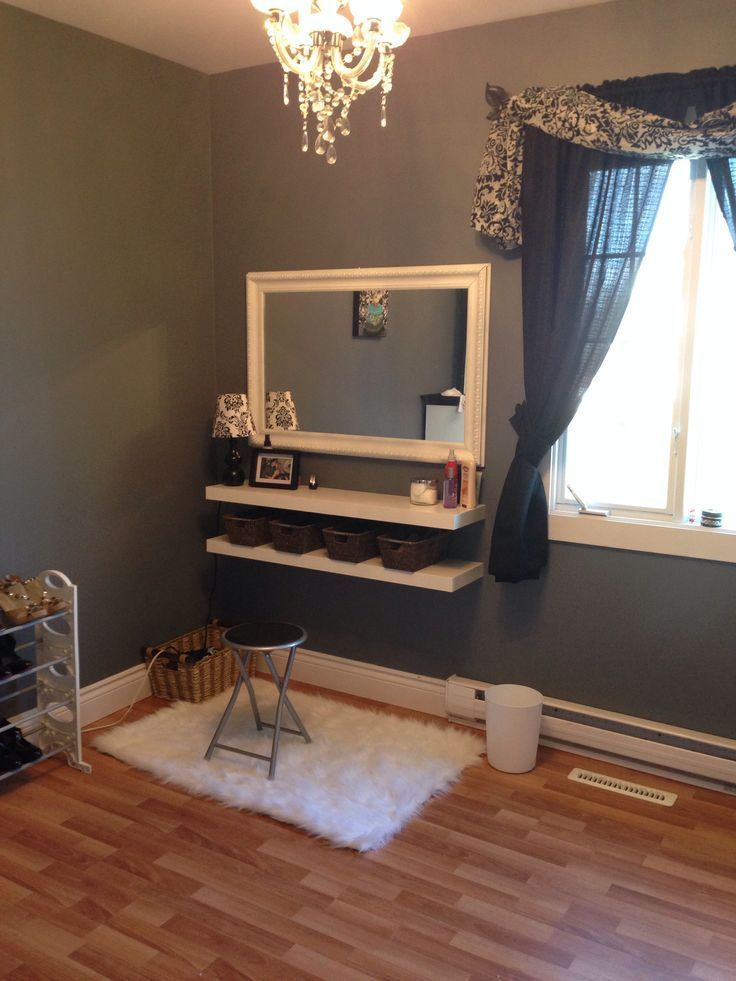 Two floating shelves   four baskets   yard sale mirror painted white = makeup vanity :) I love my “closet room”! DIY makeup