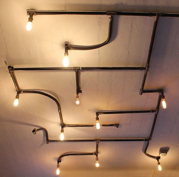 Wall or ceiling repurposed pipe light installation by urbanchandy
