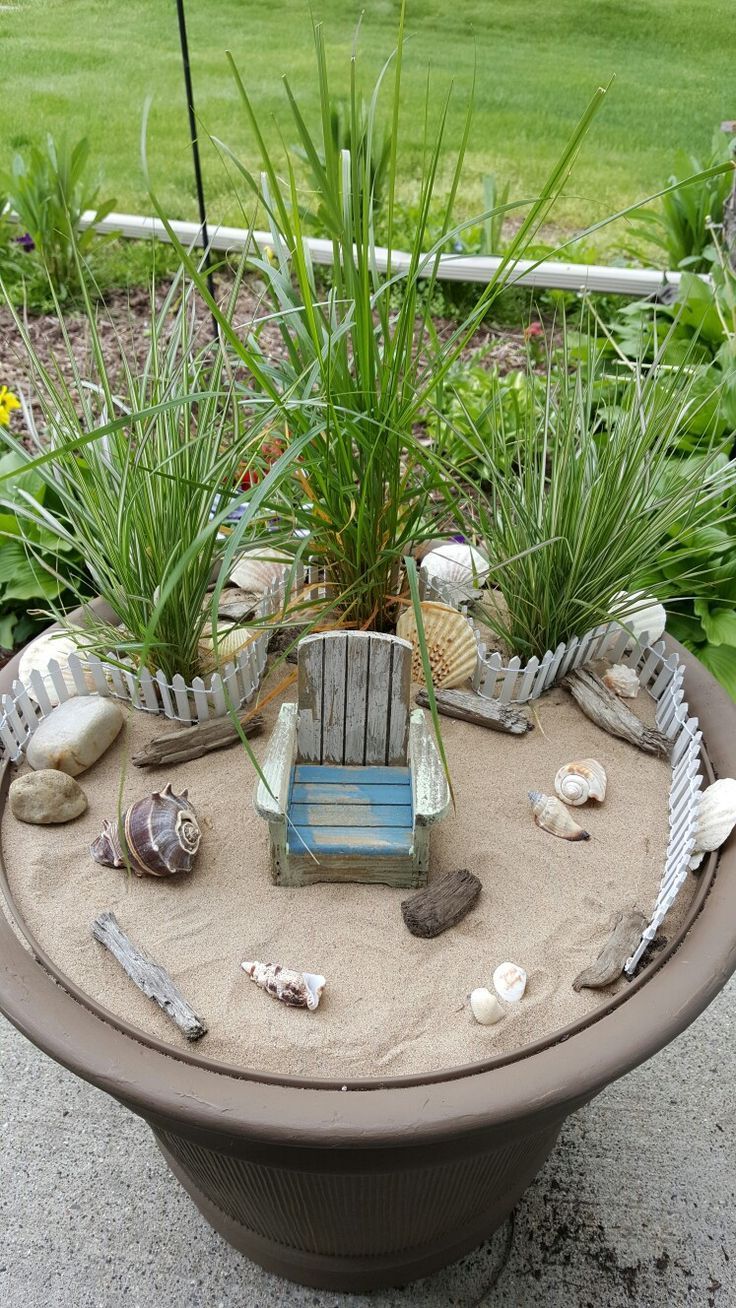 Beach fairy garden. I wonder if this would help me to “envision” my beach house…