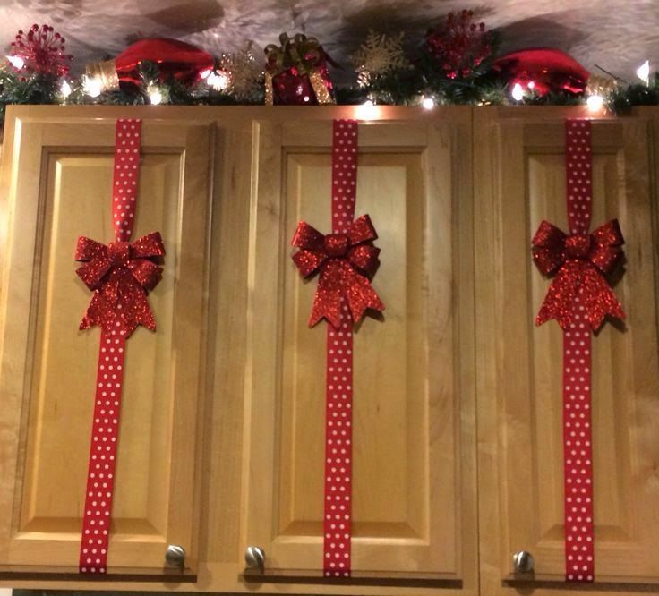 christmas decor diy inspiration — “wrap” your cabinets.  these materials would be inexpensive to get from the dollar store but