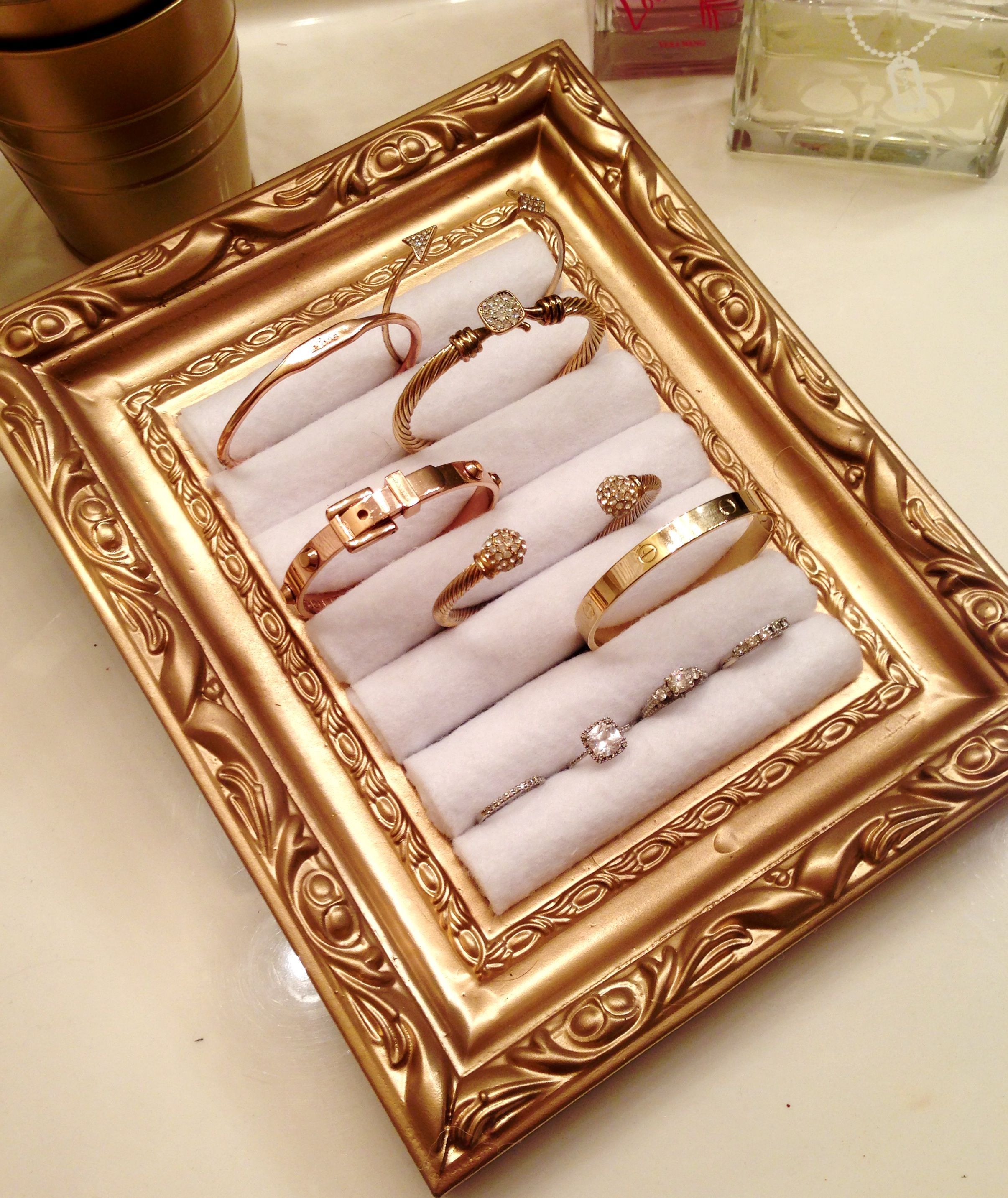 DIY Jewelry holder using a picture frame and rolled felt! Perfect for storing your favorite Stella & Dot rings!