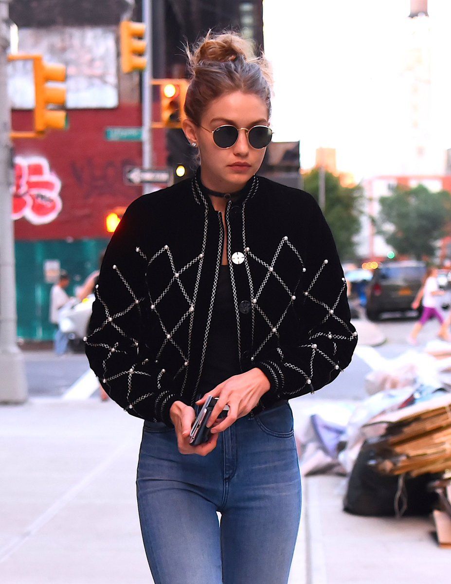Gigi Hadid velvet bomber with beaded detail, high waisted jeans, choker – street style