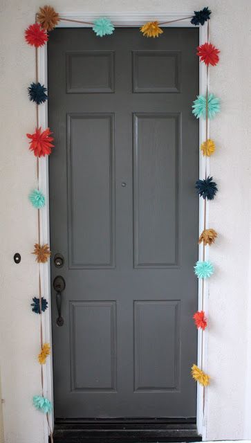 Hang a colorful garland around your door. | 28 Decorating Tricks To Brighten Up Your Rented Home