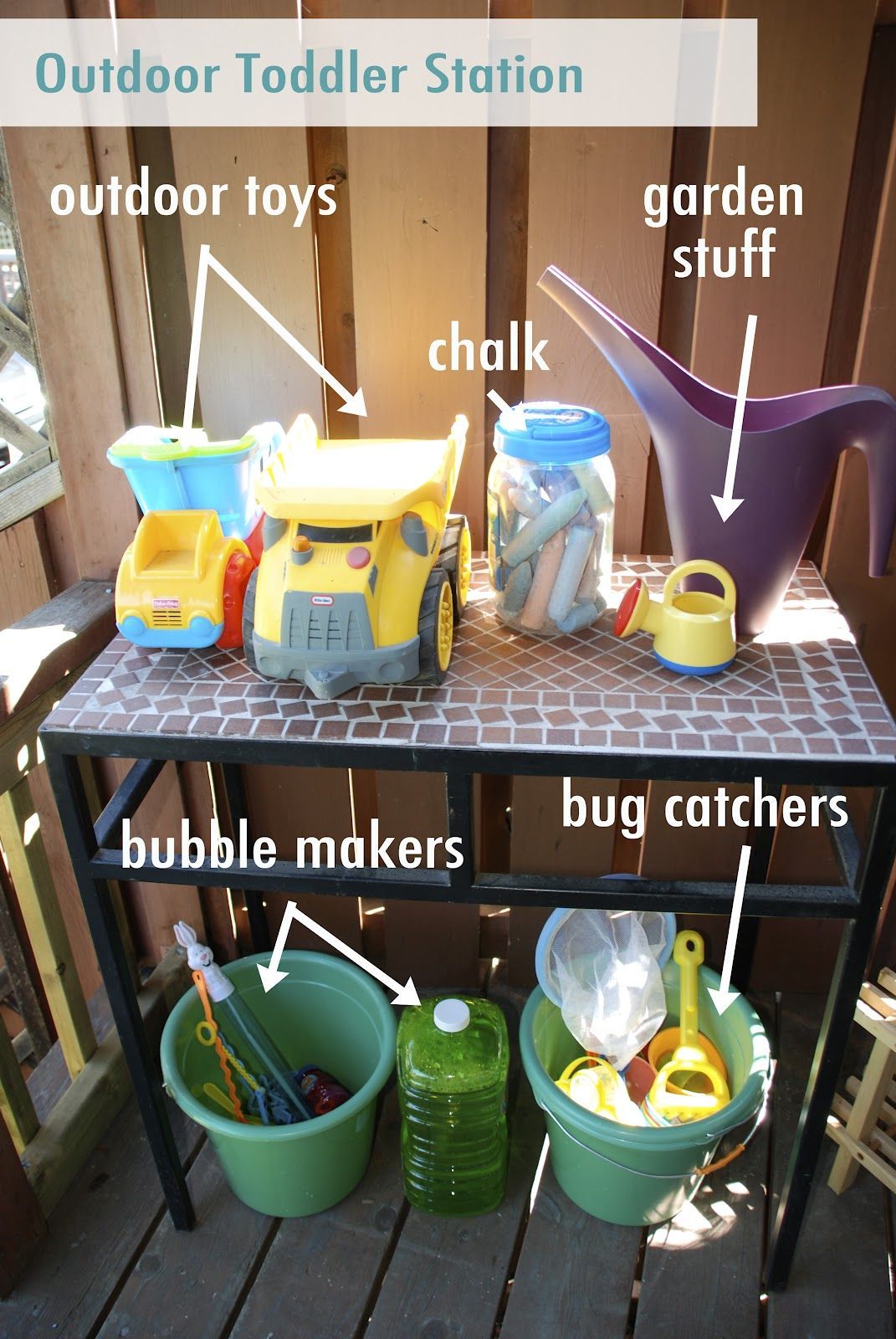 Outdoor Toddler Station- I need to do something like this, but a cabinet, not a table.