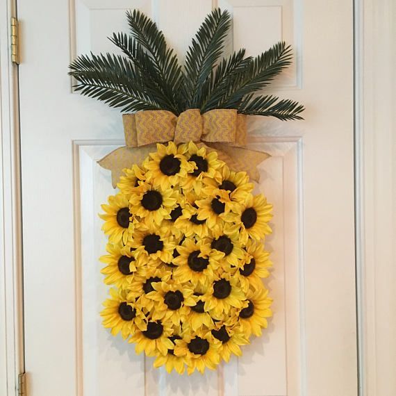 The perfect pineapple wreath! What a beautiful symbol of welcome for a front door!