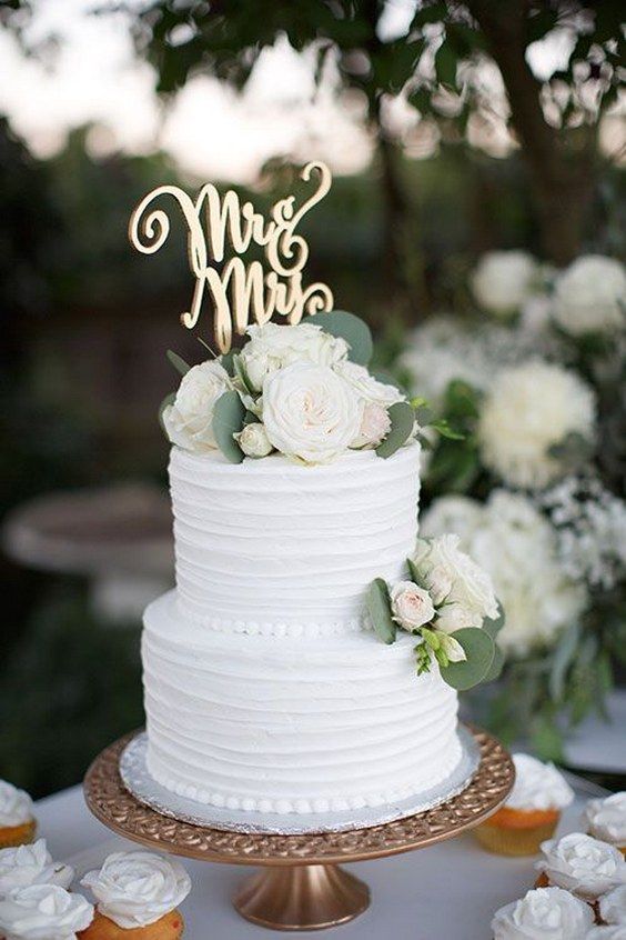 two tier white wedding cake / www.himisspuff.co…