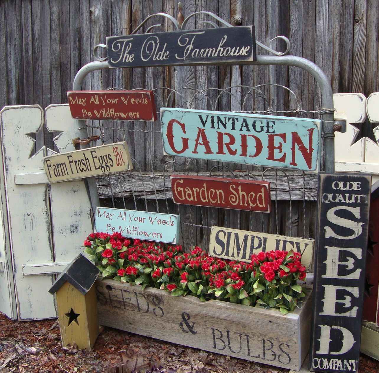 An Old Wire Gate, works well for displaying our Handmade Signs for the Garden Season.  Like us at: facebook.com/prophetbros.