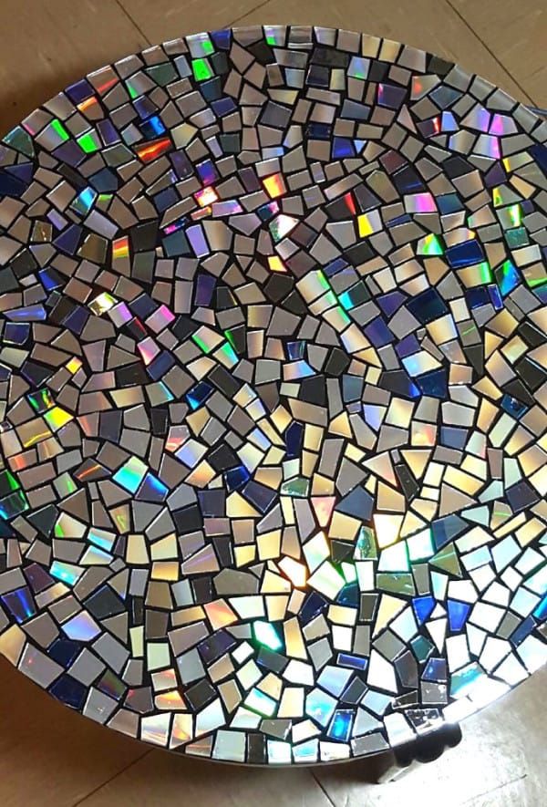 He Cuts His Old CD Collection Into Pieces. Then He Grabs ... -   Awesome Mosaic Tables Ideas