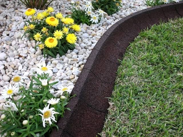 EcoBorder EarthCurb gives your yard or garden the artful look of a stone or poured concrete border   – yet with the flexibility of