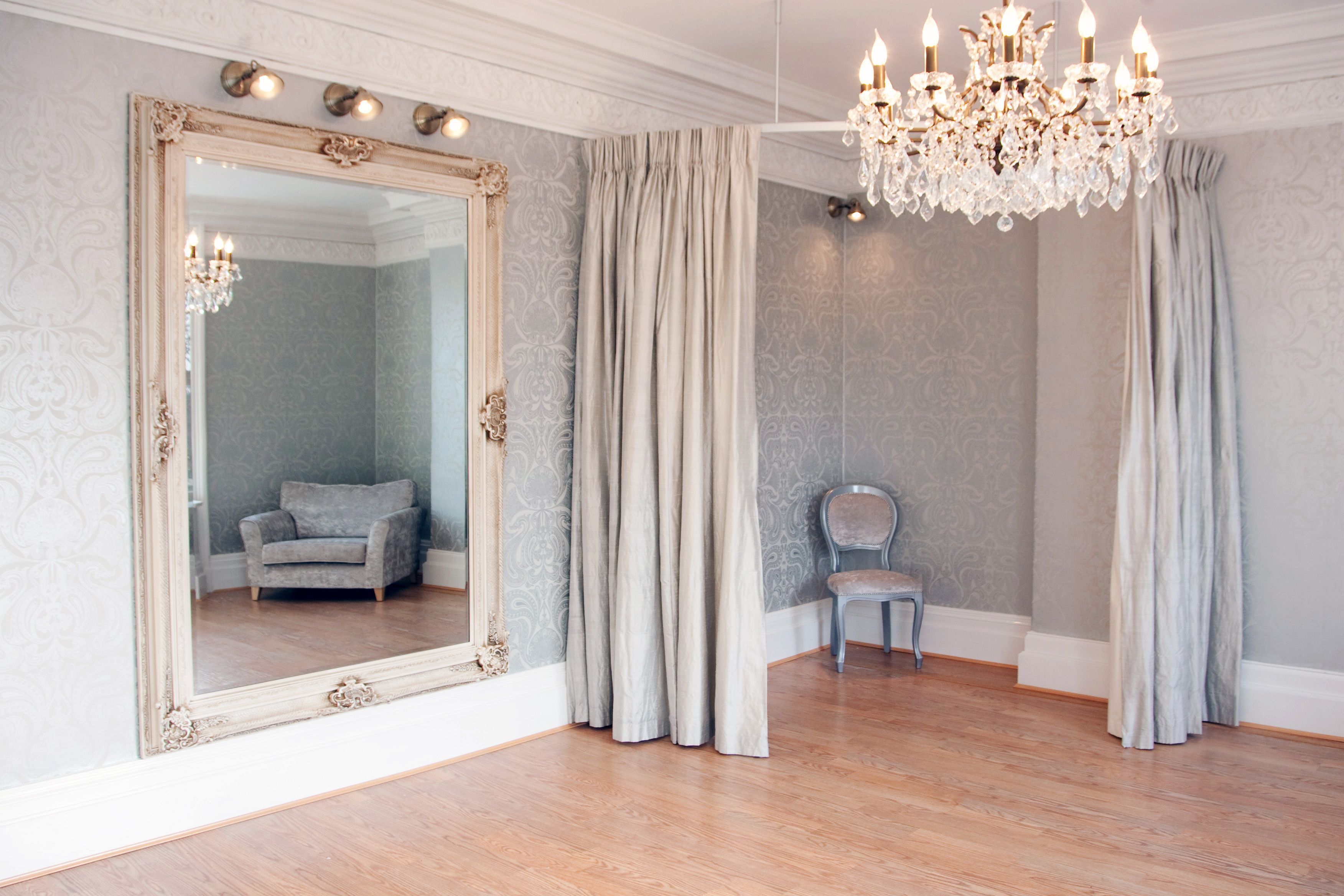 Gorgeous Bridal Boutique Interior!  A stunning dressing room to make every bride feel special.  Designed by Atlas Interiors,