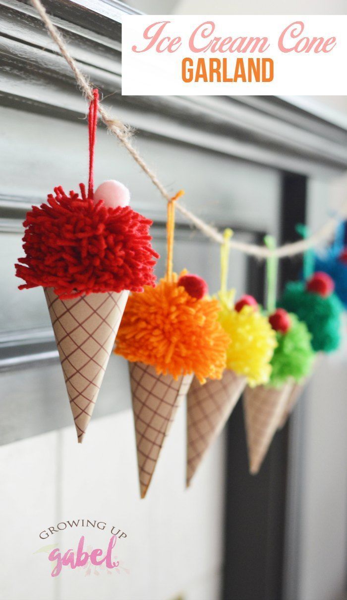 Make yarn pom poms and paper cones in to a bright and colorful DIY ice cream cone garland. These are great for an ice cream