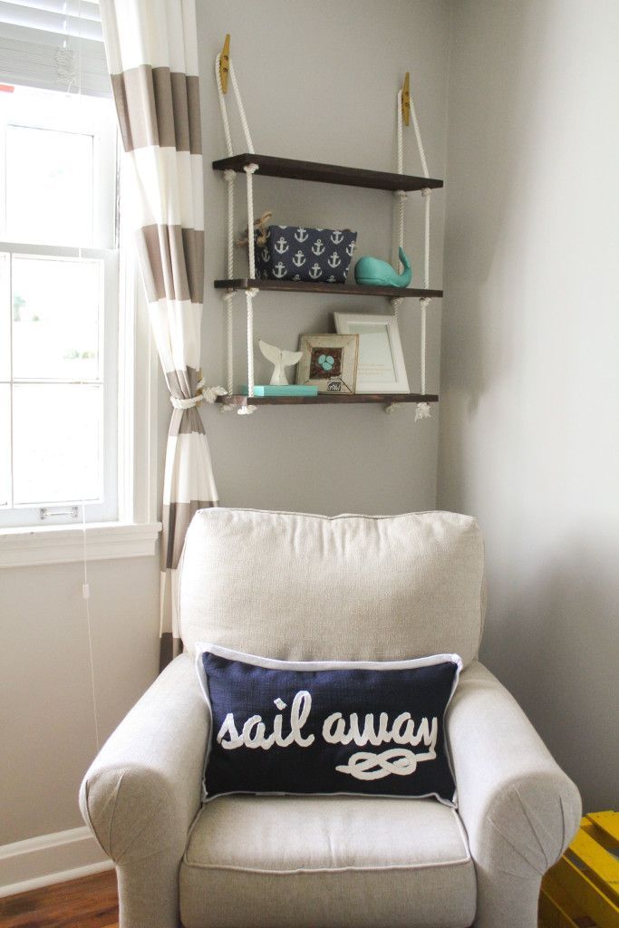 Nautical Nursery Decor – love the rope shelf and fun nautical decor items!