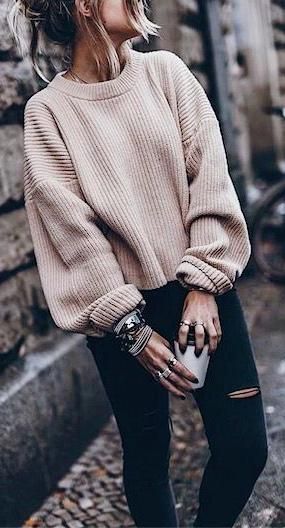 oversized nude jumper + skinny ripped black jeans. street style.