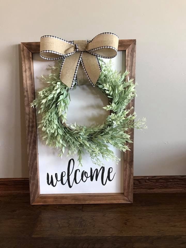 Adorable farmhouse style welcome sign with wreath