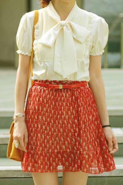 Bow blouse + printed skirt, reminds me of Zooey Deschanel