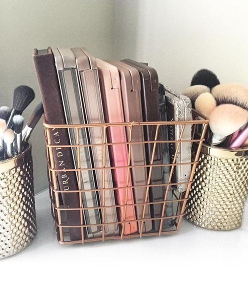 Keep all your makeup palettes on display and within reach by storing them in cool copper wire baskets on your vanity.