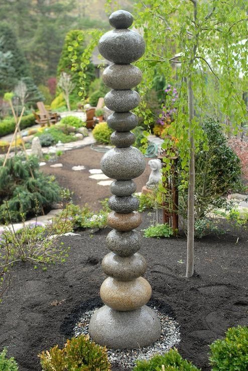 Use stacked rocks for this garden garden fountain. All I need is a roto-hammer, some tubing, a pump, a bunch of rocks, some epoxy,