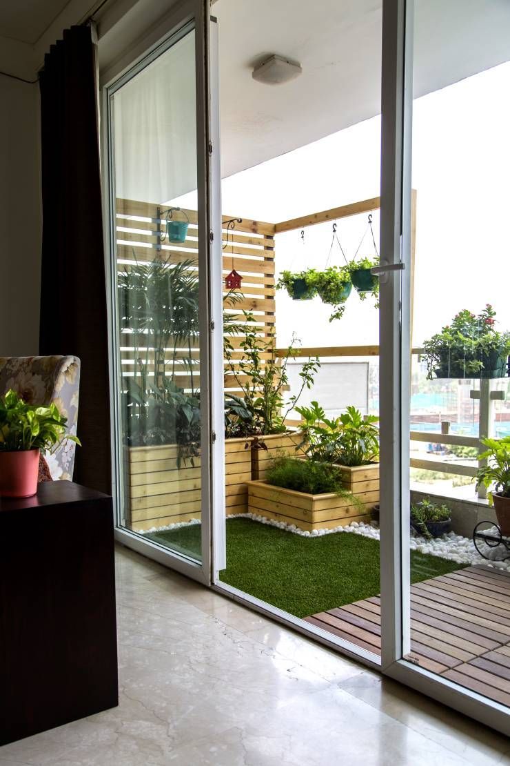 Balcony makeover—English: translation missing: in.style.terrace.country Terrace by Studio Earthbox