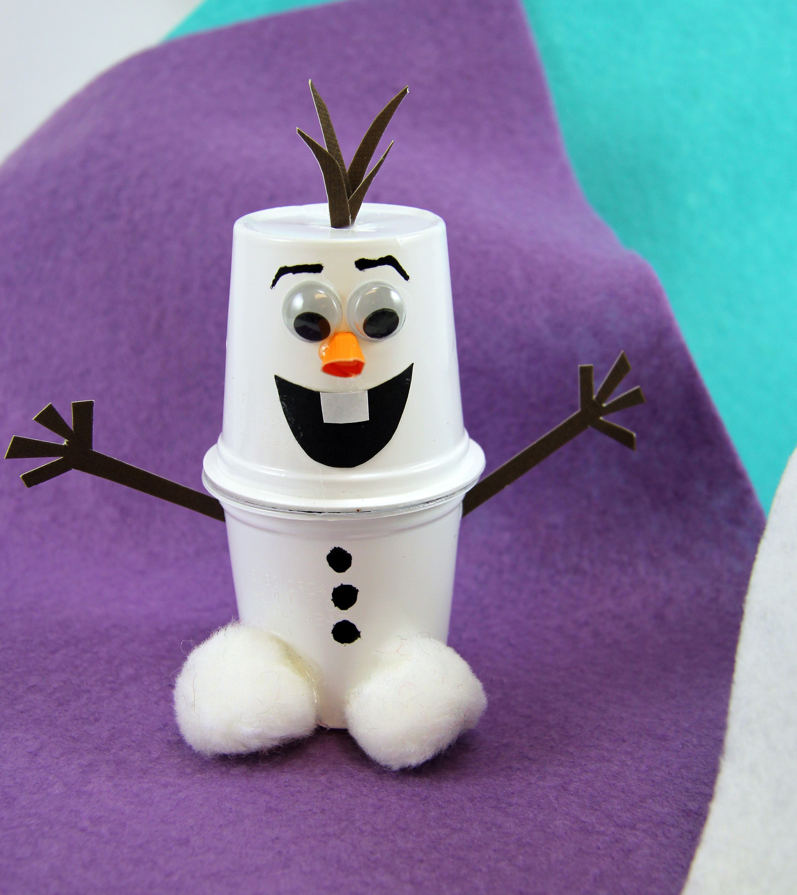 Cute K-Cup Snowman Kids Craft! Recycle your used k-cups into adorable snowmen using pom-poms, cardstock, googly eyes, and Elmer’s