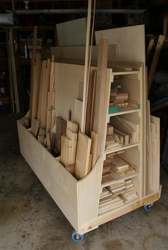DIY:  Lumber Storage System Tutorial ~ This is awesome! The slots allow you to organize horizontally & vertically, keeping lumber