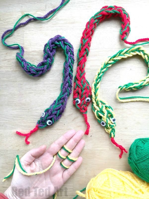Finger Knitting Snakes – these snakes are so cool and fun to make. Learn about finger knitting with two colours of yarn, as well