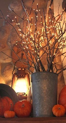 I have seen these faux branches with little LED lights on the ends in several stores they may be interesting to use for an evening