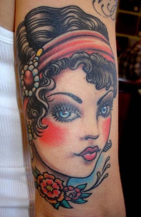 i usually don’t like big faces as tattoos, but something about this one grabs me..