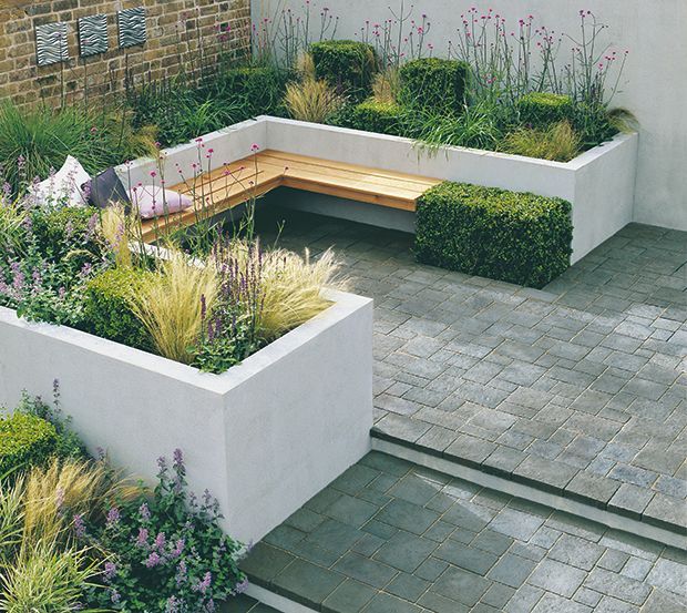 raised planters and seating made from clockwork