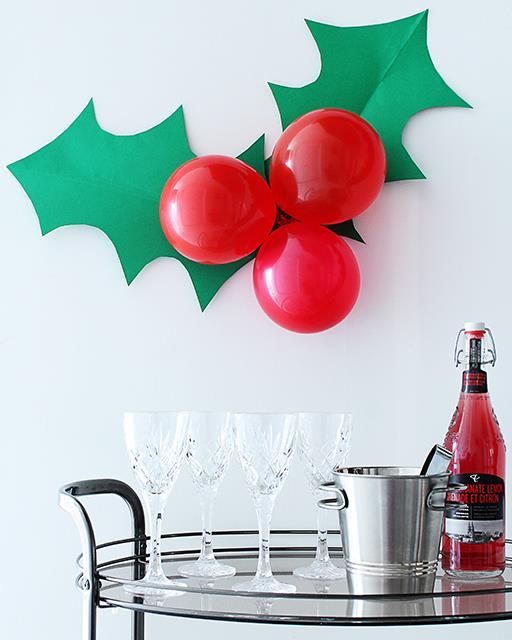 A giant sprig of holly to decorate for your next holiday party!
