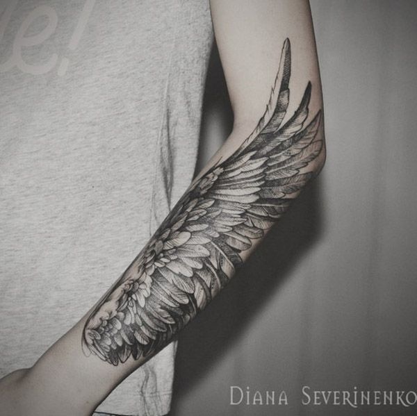 A majestic looking sleeve tattoo. If only we had wings then we could fly. This tattoo design simply shows the beauty of having