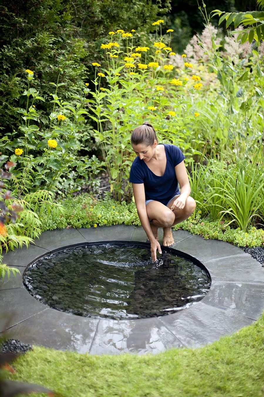 circular stone water mirror for the garden from www.pithandvigor.com