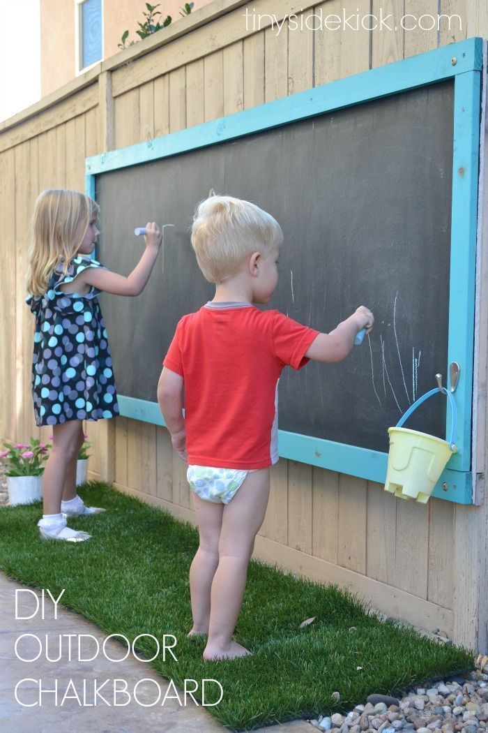 How to make a giant outdoor chalkboard for your yard. This is such a perfect outdoor activity for the kids and it has held up for
