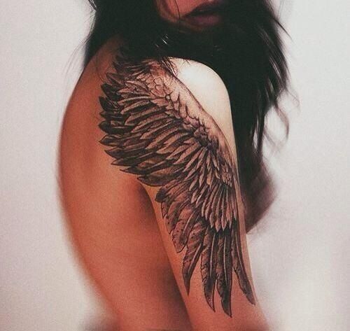 i really do love wings tattoos but they are so overdone. this is really good though, i like the way it goes down her arm, not back