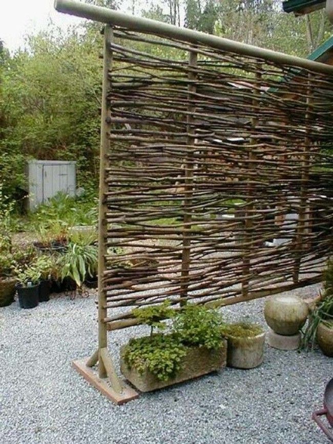 Twig privacy screen – neat way to use twigs that fall.