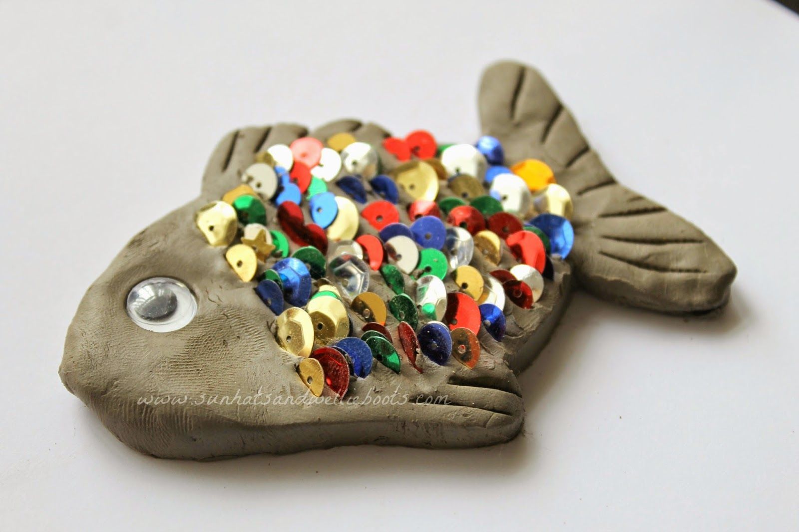 Cool kids art project. Clay fish with sequin scales. From Sun Hats & Wellie Boots