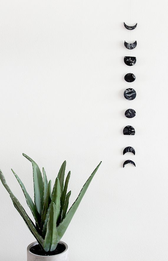 DIY Marble Moon Phase Wall Hanging from Almost Makes Perfect