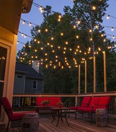 Hang Patio Lights across a backyard deck, outdoor living area or patio. Guide for how to hang patio lights and outdoor lighting