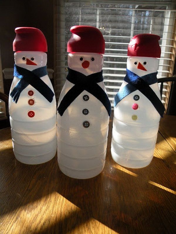 snowmen from coffee creamer containers, Cool Snowman Crafts for Christmas, http://hative.com/cool-snowman-crafts-for-christmas/,