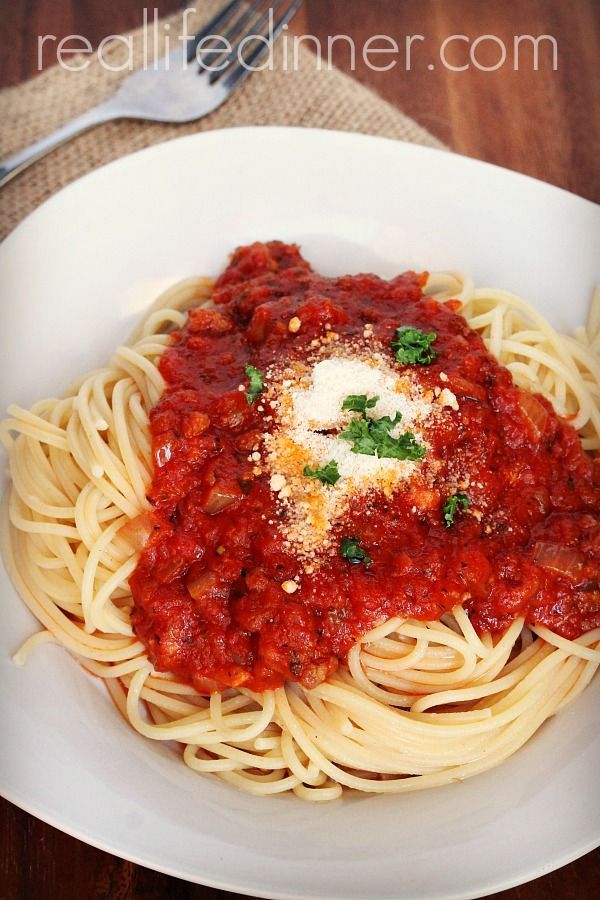 Amazing Simmered Spaghetti Sauce. Can make a large batch and freeze in portions. | reallifedinner.com