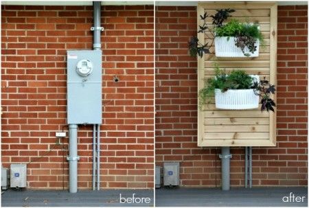slatted panel with planters hide electric meter