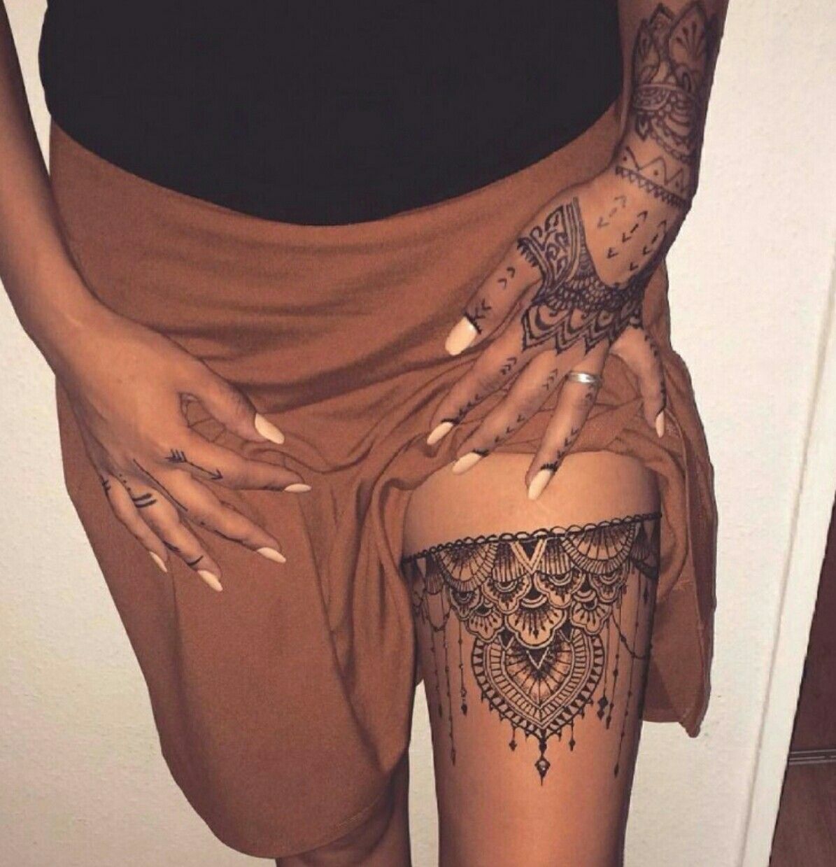 On the leg -   21 lace thigh tattoo
 ideas