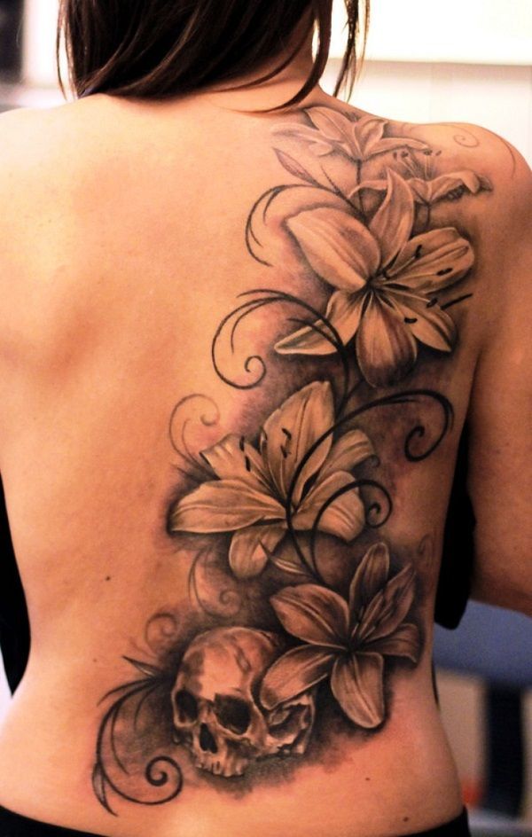 60 Beautiful Lily Tattoo Ideas -   23 skull tattoo ideas