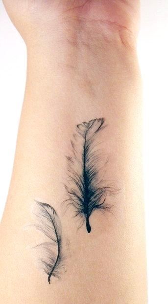 Small Tattoos - Feather Tattoo -   24 black feather tattoo
 ideas