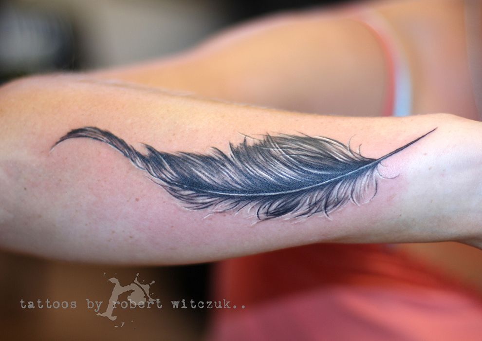 Feather Tattoos by Robert Witczuk. I love the elegance of this particular design. -   24 black feather tattoo
 ideas