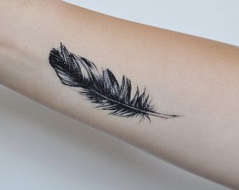 Feather Tattoo -   24 black feather tattoo
 ideas