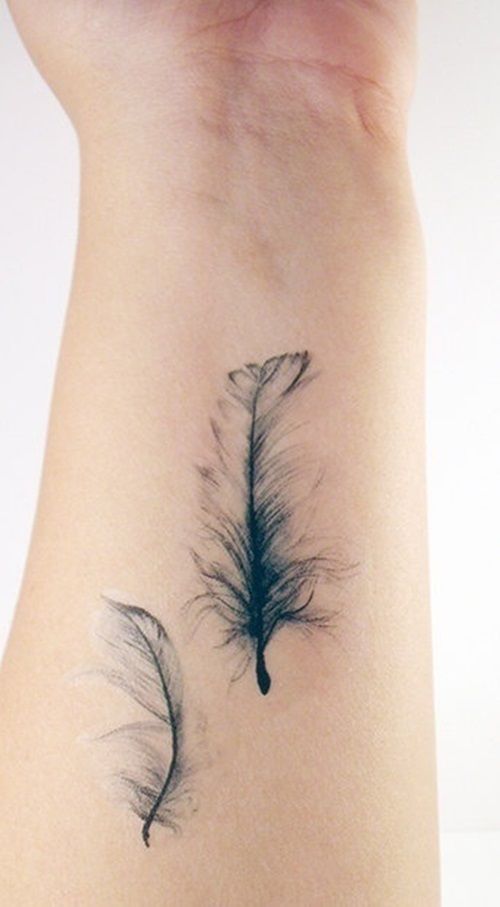 whimsically watercolored feathers -   24 black feather tattoo
 ideas