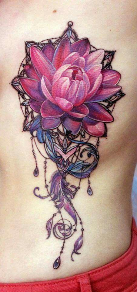 Pretty pink purple flower tattoo with feathers -   24 pink lotus tattoo
 ideas