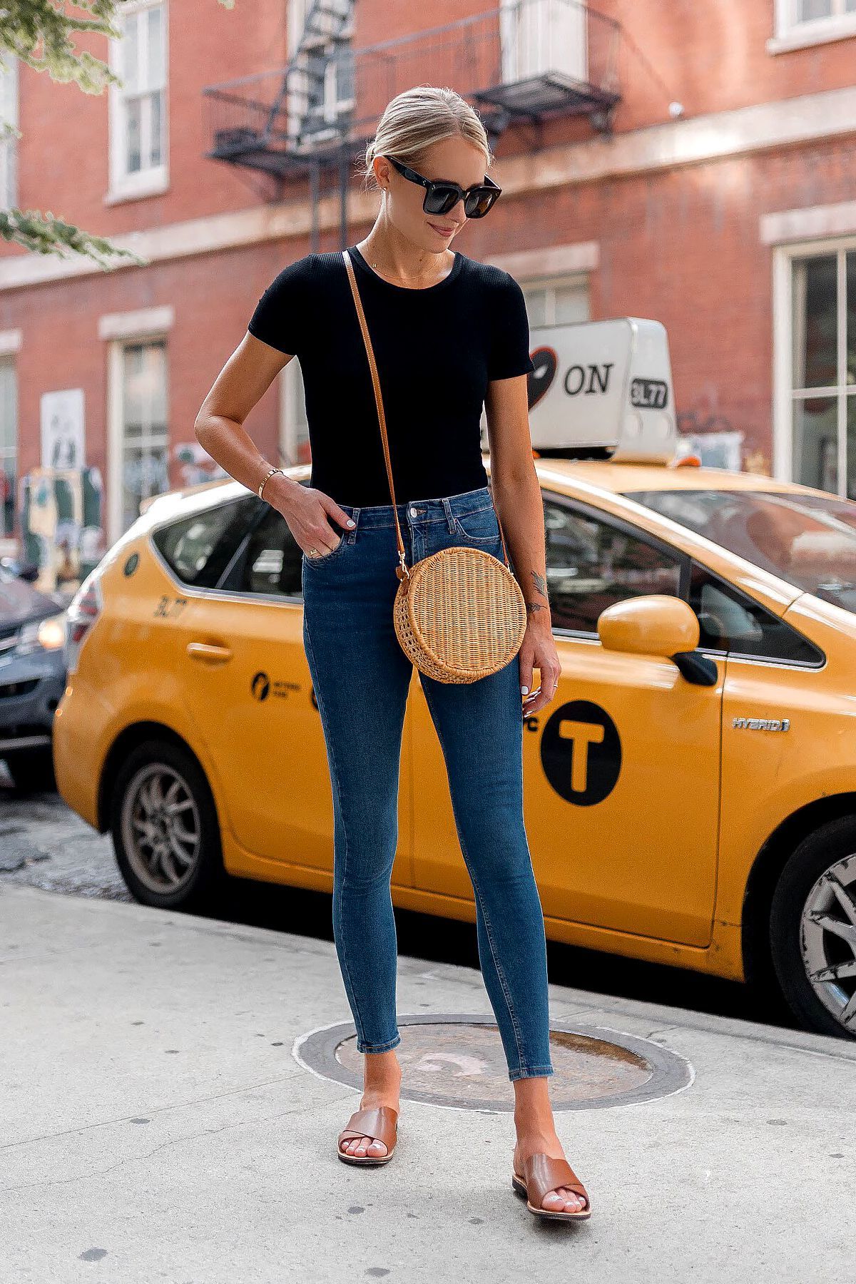 Blonde Woman Wearing Bloomingdales Black Short Sleeve Bodysuit Denim Skinny Jeans Tan Flat Sandals Circle Straw Handbag Black Sunglasses Fashion Jackson Dallas Blogger Fashion Blogger New York Street Style -   25 black style fashion
 ideas