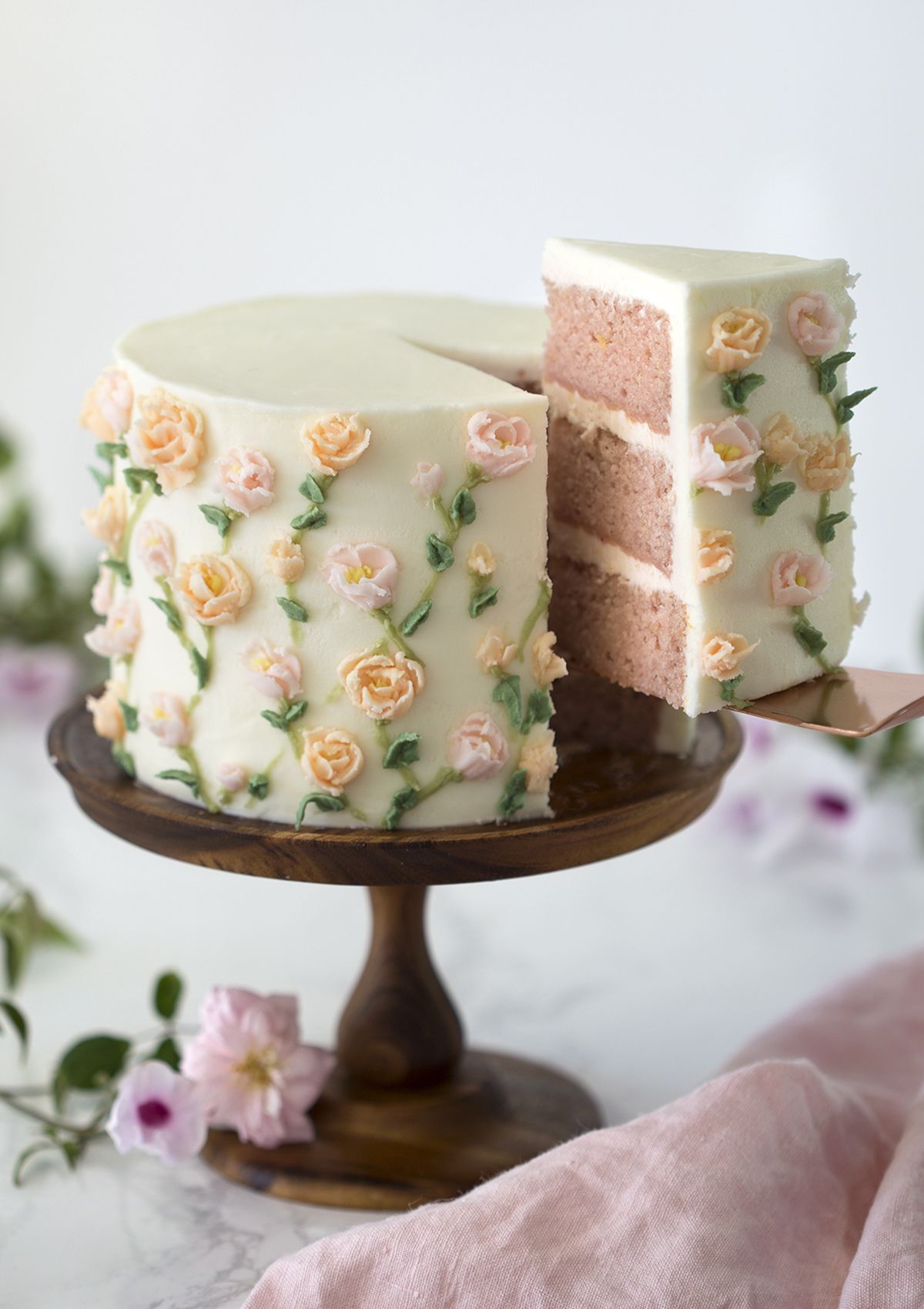 A moist strawberry cake with a kiss of lemon covered in delicate buttercream flowers. -   22 cake decor buttercream
 ideas