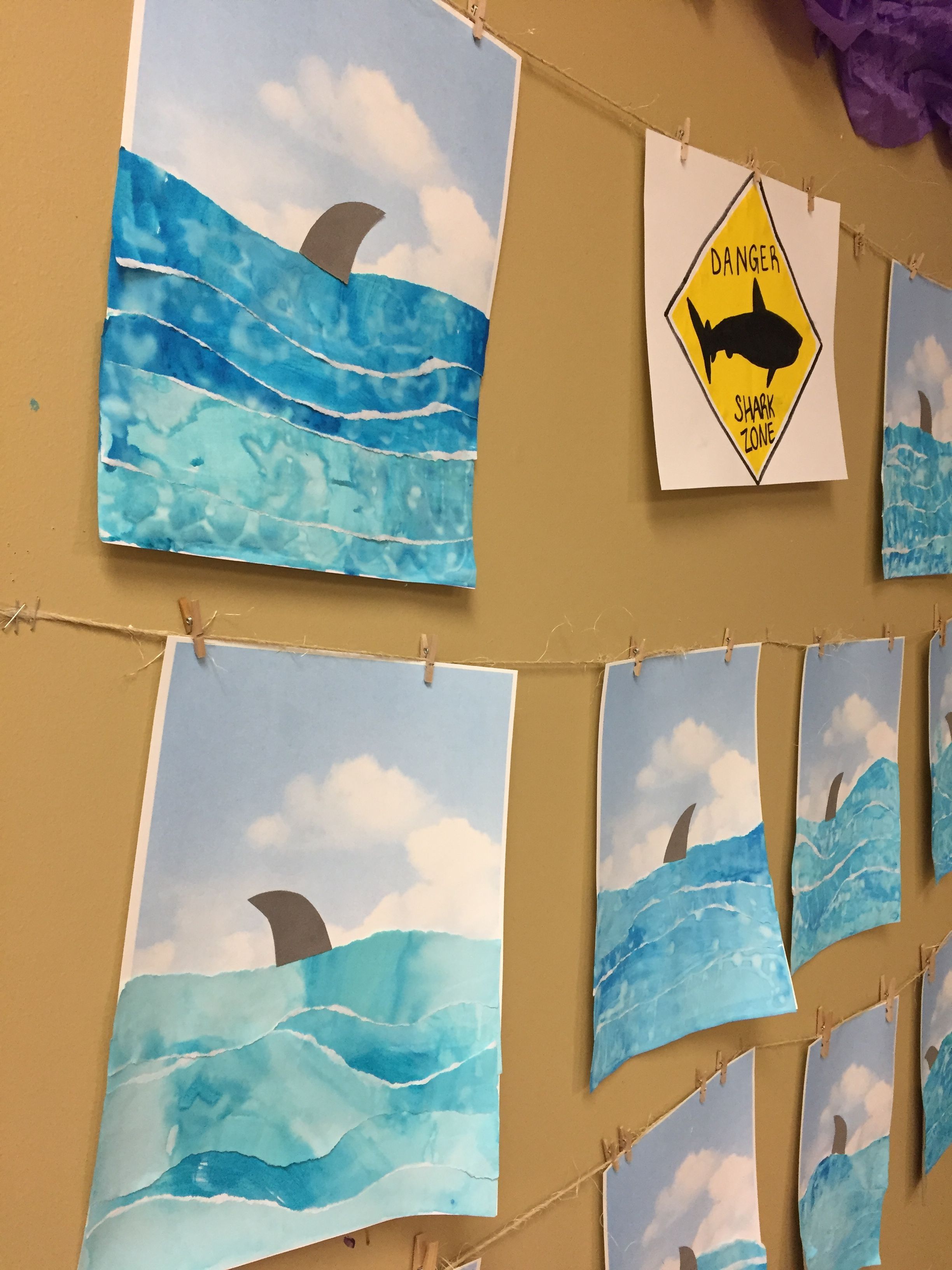 Ripped water color paper to create ocean on sky paper with shark fin art project for kids -   25 ocean crafts shark
 ideas